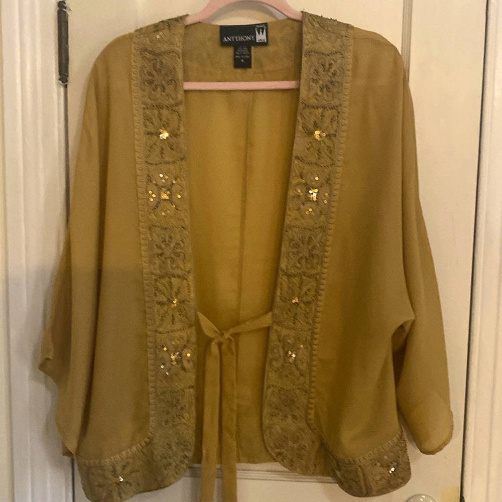 Gold jacket by Anthony in medium.